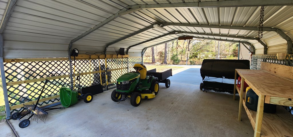 Included John Deere mower and tools